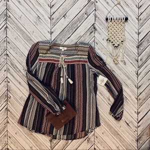 NEW Patterned blouse with tassels